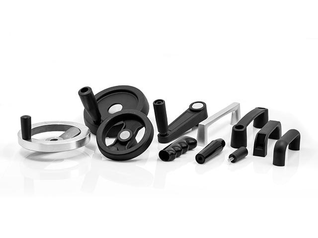 Handgrepen en handwielen